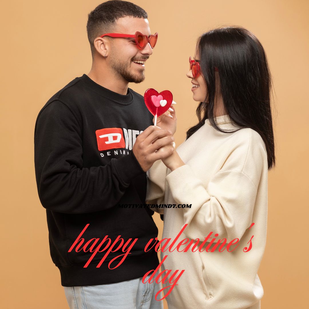 Couple holding one popsicle stick of heart shape and they wears heart shaped shades also.