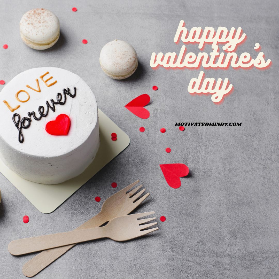 A white cake with red heart and love forever written on the cake.