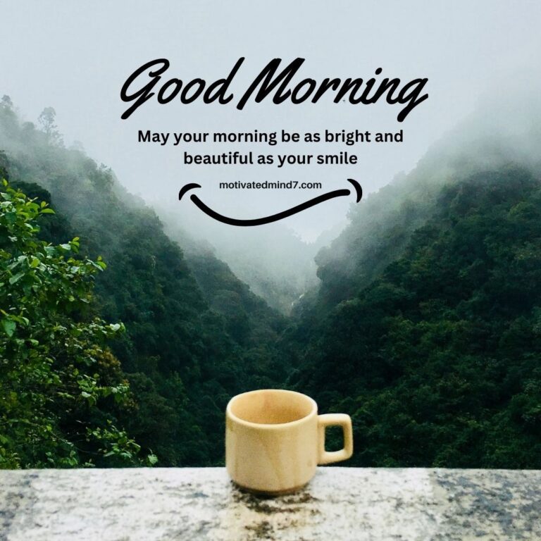 A cup on a ledge overlooking a valley