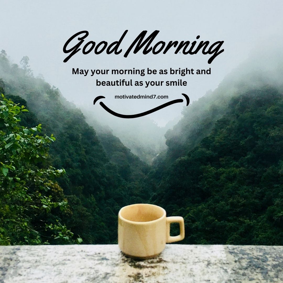 a cup on a ledge overlooking a valley